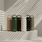 Powerhouse Fitness reusable 16 oz tumblers in multiple colors on stone display pedestal